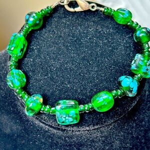 Hand Blown Art Glass Bracelet. Blue, Yellow & Green Swirl. 8". Various Shapes.